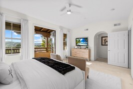 Primary suite with mountain-view balcony